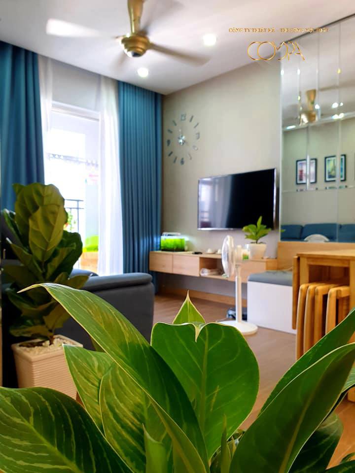 Phòng khách ấn tượng với nhiều gam màu dễ thương với nội thất ván công nghiệp Phòng khách ấn tượng với nhiều gam màu dễ thương với nội thất ván công nghiệp